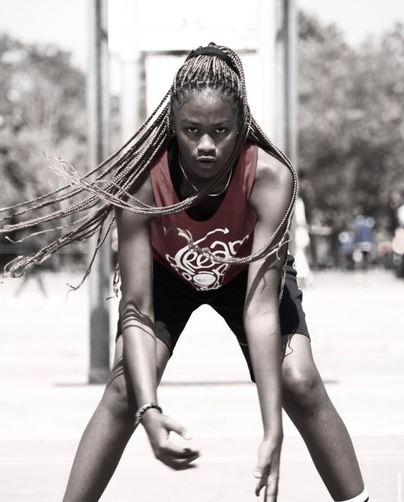Jessica Ohaka in basketball kit, crouched and ready